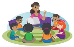 Maestra lee frente a los niños.jpg